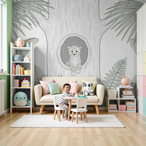 Jungle leopard mural wallpaper creating tropical nursery atmosphere with baby leopard in tree by Kids-Mundo