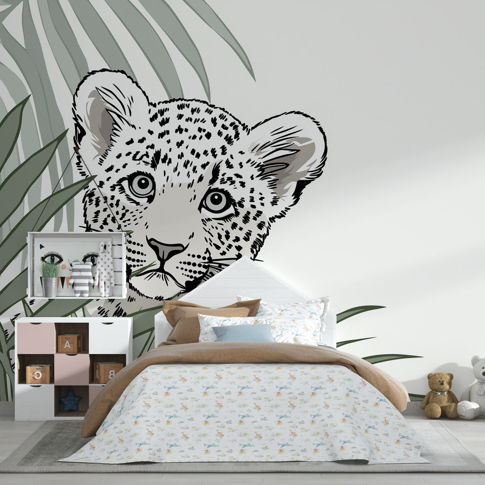 Tropical leopard wallpaper creating adventure-themed children's playroom by Kids-Mundo