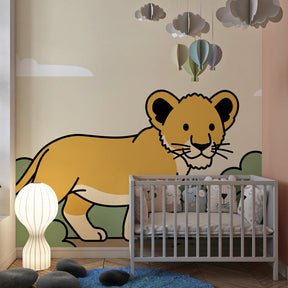 Safari lion wallpaper creating adventure-themed kids bedroom with tropical foliage