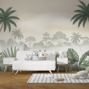 Soft green jungle mural wallpaper complementing natural wood nursery furniture