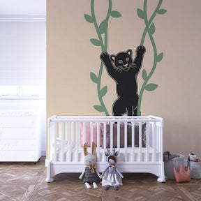 Animal jungle mural wallpaper with panther cub design in colorful kids playroom setting