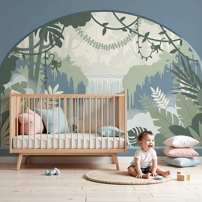 Kids-Mundo jungle waterfall arch wall mural styled behind a cot in a calm blue nursery