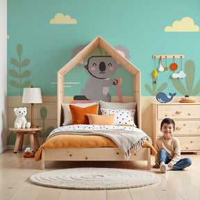 Koala adventure mural wallpaper featuring scooter riding koala in modern kids nursery by Kids-Mundo