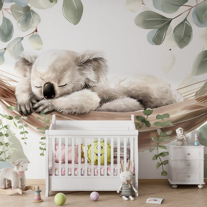 Kids-Mundo koala wall mural with eucalyptus leaves displayed on a soft, leafy playroom wall