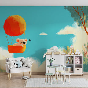 Adventure themed koala balloon wallpaper creating dreamy atmosphere in children's bedroom