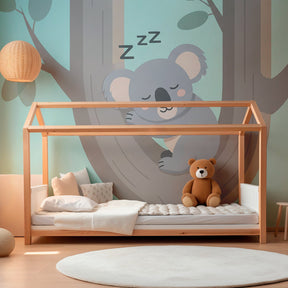 Gentle koala animal wallpaper for baby room featuring sleeping koala in tree design