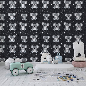 Koala animal wallpaper creating peaceful atmosphere in children's bedroom with natural wood furniture