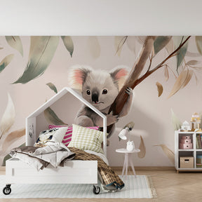 Australian koala mural wallpaper with pastel leaves in cozy kids room setting