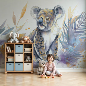 Koala tropical foliage mural wallpaper in modern nursery with natural wood crib by Kids-Mundo