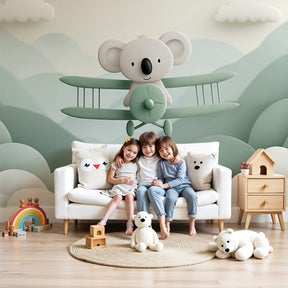 Koala pilot adventure mural wallpaper in modern nursery with wooden crib by Kids-Mundo