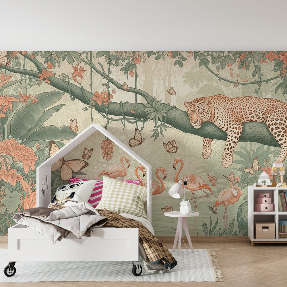 Kids-Mundo leopard and flamingo mural brightening a playroom wall filled with books and toys