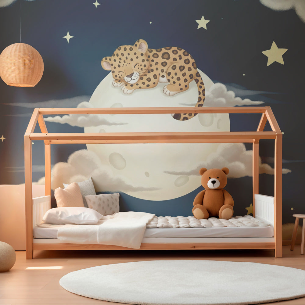 Dreamy night sky leopard wallpaper creating magical atmosphere in children's bedroom
