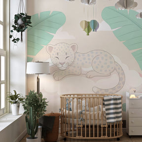 Peaceful leopard wallpaper creating serene tropical atmosphere in children's bedroom decor