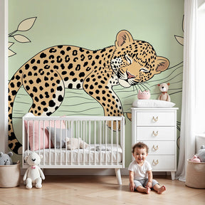 Sleeping leopard mural wallpaper creating peaceful nursery decor with natural wood furniture by Kids-Mundo