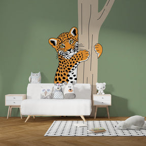 Nature-themed leopard wallpaper transforming playroom into wildlife sanctuary for kids