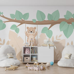 Jungle-themed leopard mural wallpaper transforming kids playroom into adventure space