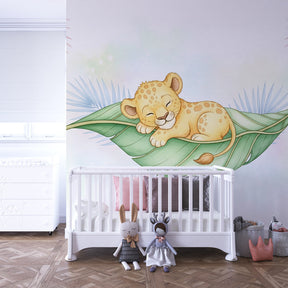 Golden baby leopard wallpaper in modern kids bedroom with soft textures and warm lighting