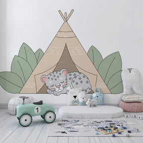 Tropical leopard tipi mural wallpaper with green foliage creating adventure-themed playroom by Kids-Mundo