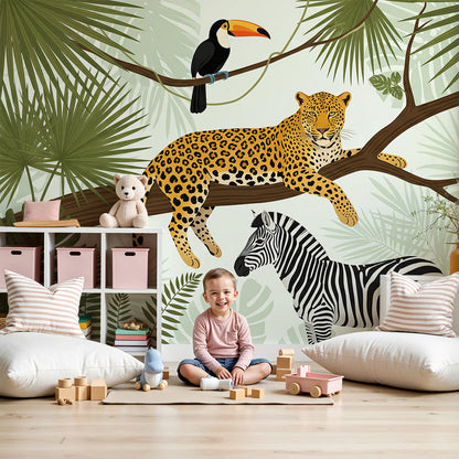 Kids-Mundo leopard, toucan and zebra jungle wall mural styled in a nursery with cot and rug.