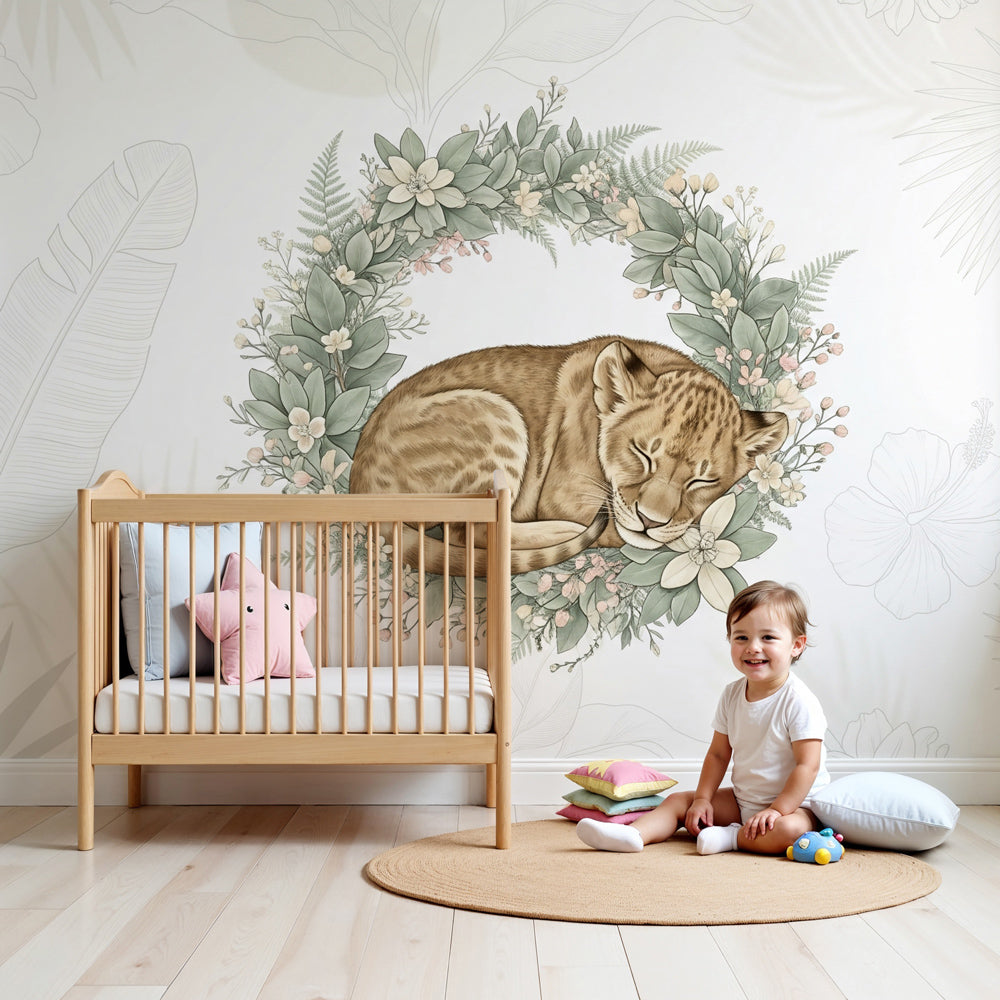 Sleeping lion cub mural wallpaper with floral wreath in modern nursery by Kids-Mundo