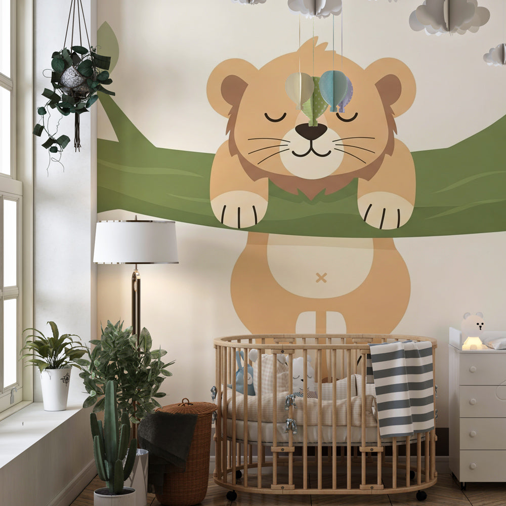 Gentle lion cub mural wallpaper with natural green leaves for toddler room