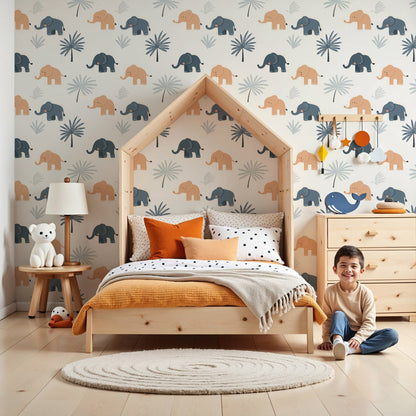 Kids-Mundo little elephants pattern wallpaper shown covering a feature wall in a soft nursery.