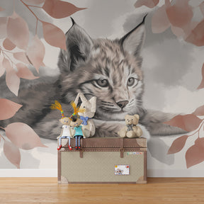 Young lynx among leaves wallpaper transforming children's bedroom into serene forest sanctuary