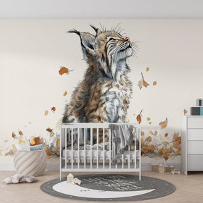 Wildlife lynx wallpaper with golden autumn leaves in modern kids bedroom setting