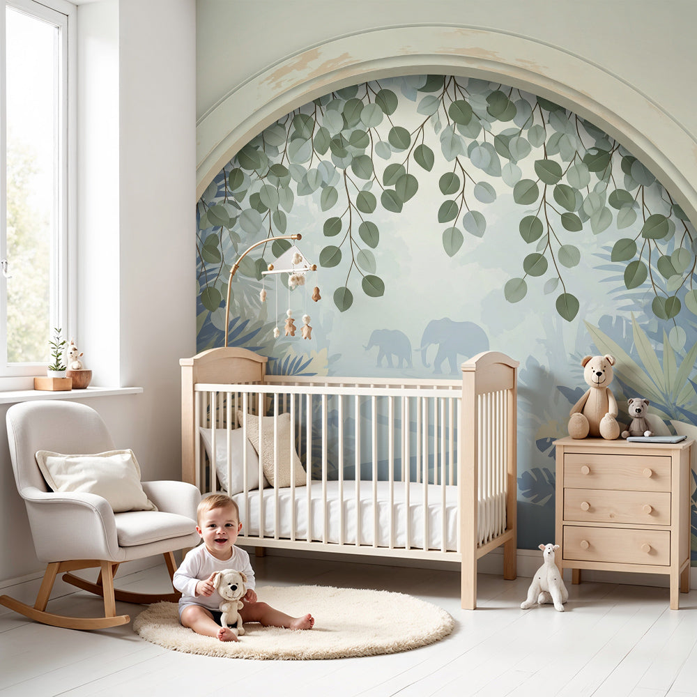 Kids-Mundo misty blue jungle elephant wall mural in a calm nursery with a cot