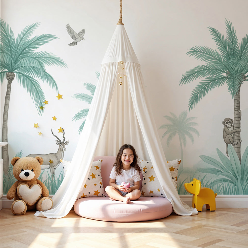 Kids-Mundo misty jungle antelope and monkey wall mural on a nursery wall behind a cot