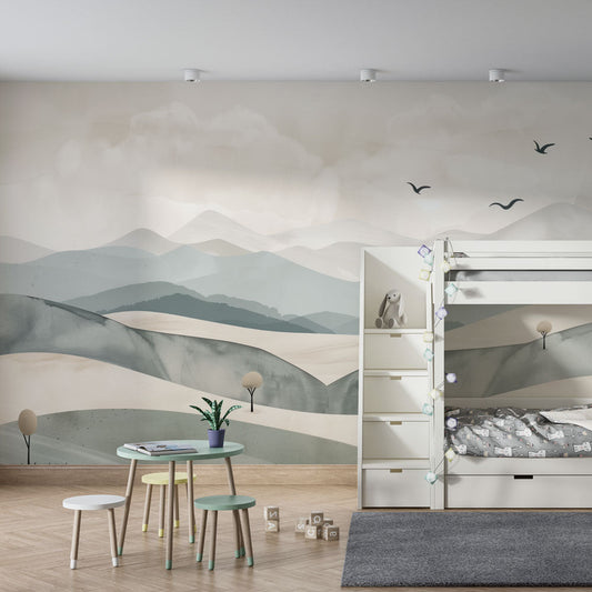 Kids-Mundo pastel mountain wall mural covering a feature wall in a modern kids bedroom with warm wood tones.
