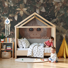 Curious monkey jungle mural wallpaper in modern nursery with natural wood crib by Kids-Mundo