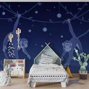 Starry night monkey wallpaper creating magical kids bedroom atmosphere with wooden furniture