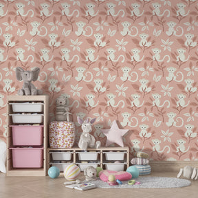 Safari monkey mural wallpaper for kids room showing soft pink animal themed wall decoration