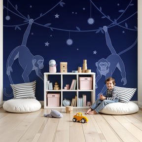 Playful monkey mural wallpaper in modern nursery with starry night jungle theme by Kids-Mundo