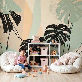 Monstera leaves mural wallpaper in pastel nursery with modern crib by Kids-Mundo