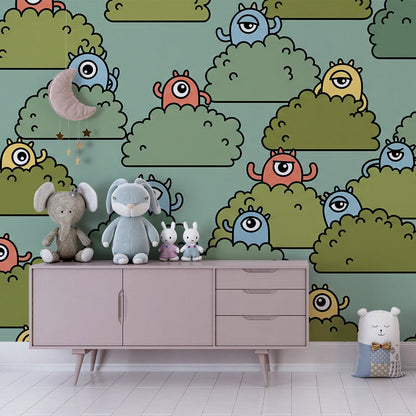 Playroom feature wall with a Kids-Mundo monster wall mural showing playful faces hiding in bushes.