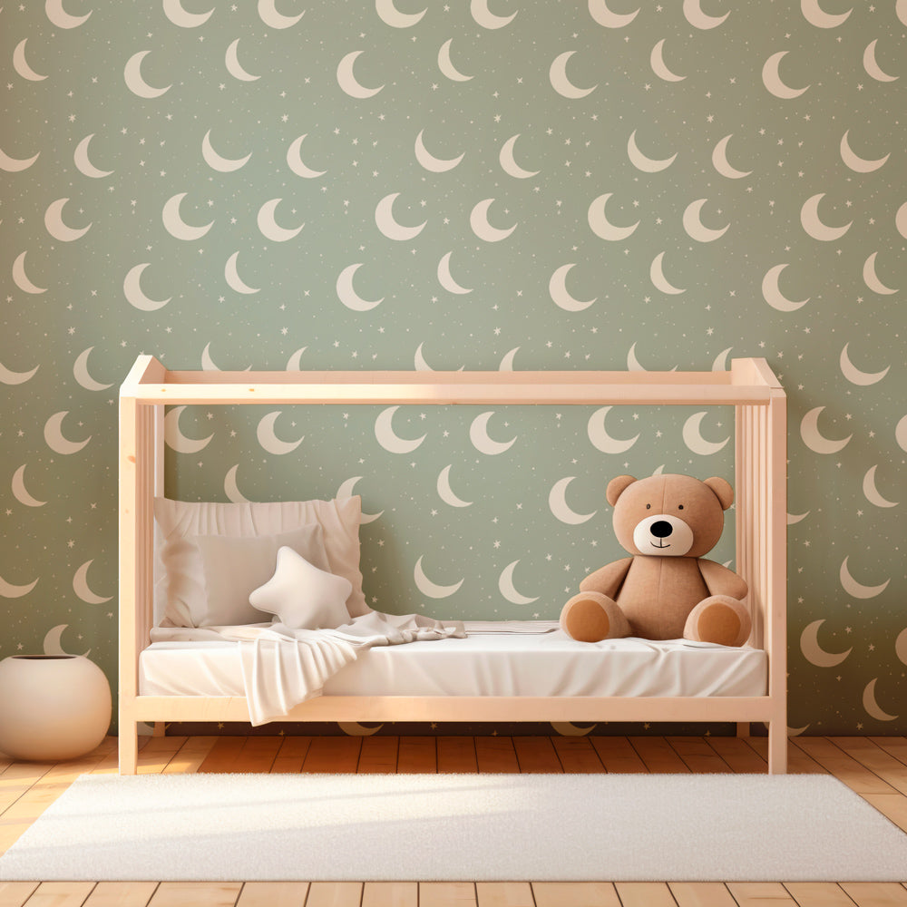 Pale green moon star mural wallpaper transforming toddler room into magical nighttime sanctuary