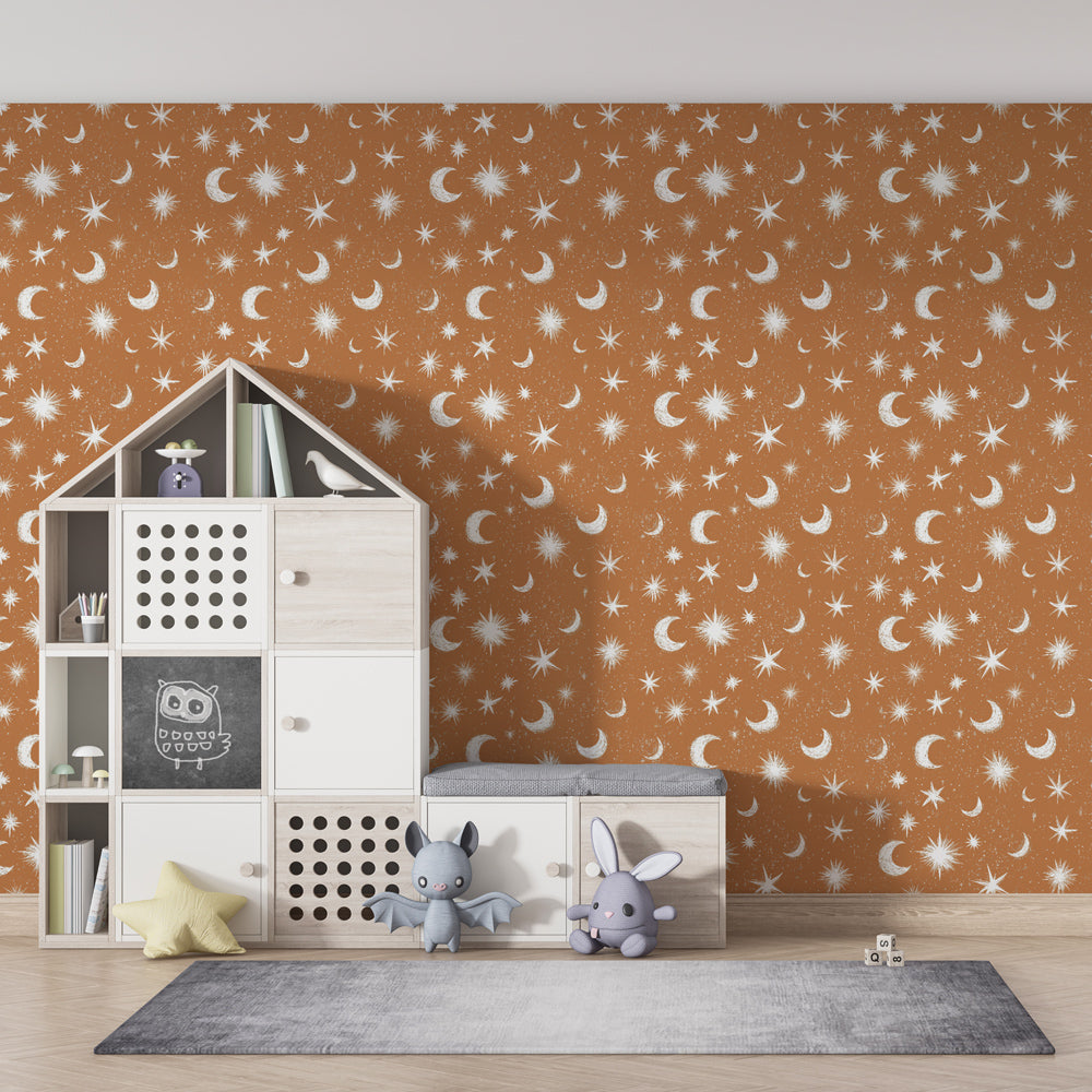 Celestial mural wallpaper featuring crescent moons on warm terracotta background for kids