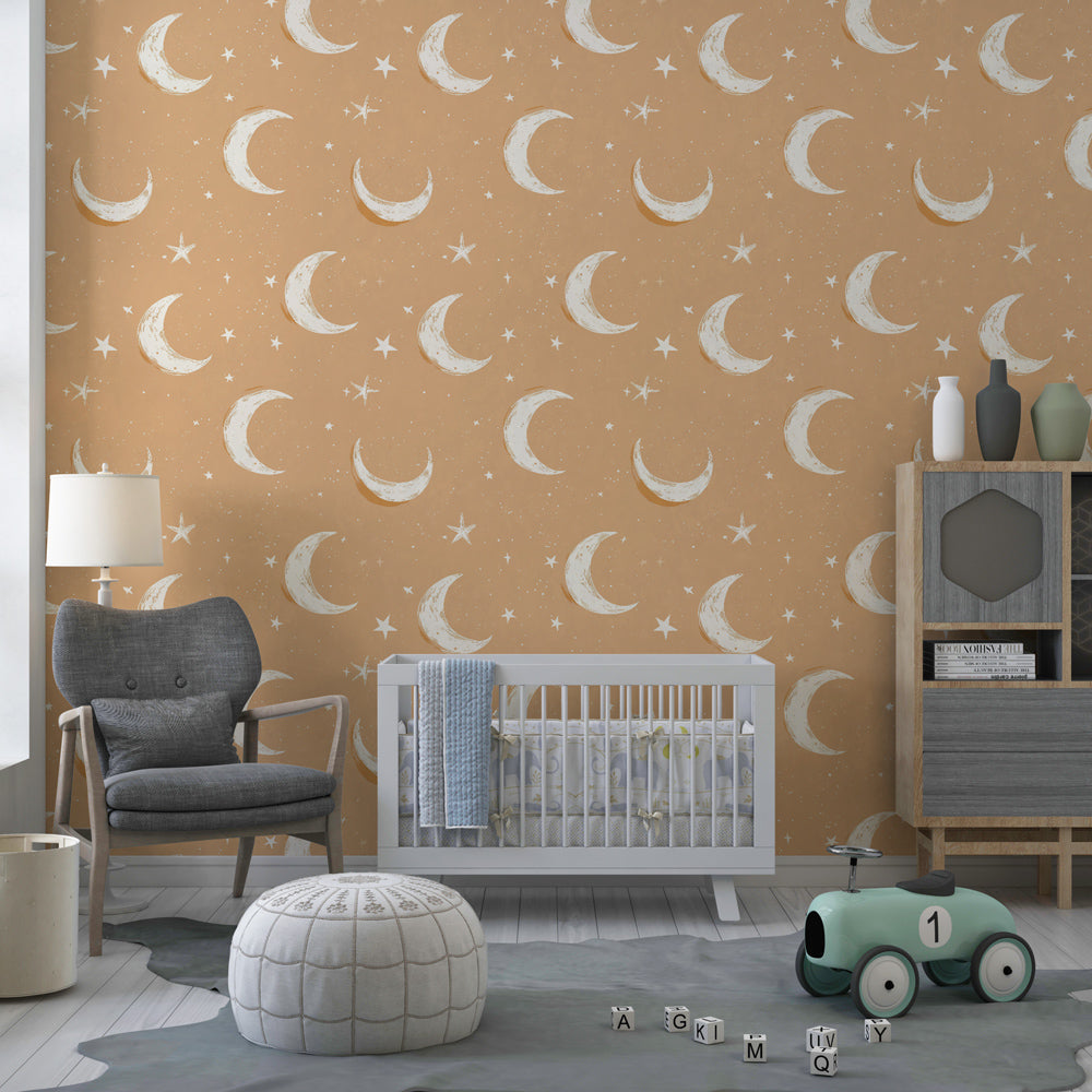 Orange moon and stars mural wallpaper in children's bedroom creating peaceful sleep environment