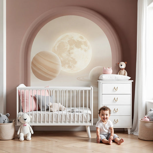 Kids-Mundo moonlit archway planet wall mural styled behind a cot in a soft pink nursery