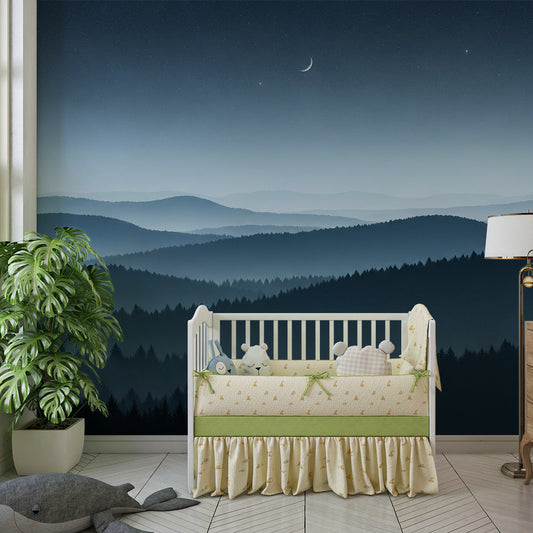 Kids-Mundo mountain wall mural covering a bedroom feature wall with a crescent moon and pine forest