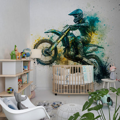 Kids-Mundo motocross wall mural brightening a playroom with energetic teal and gold splash artwork.