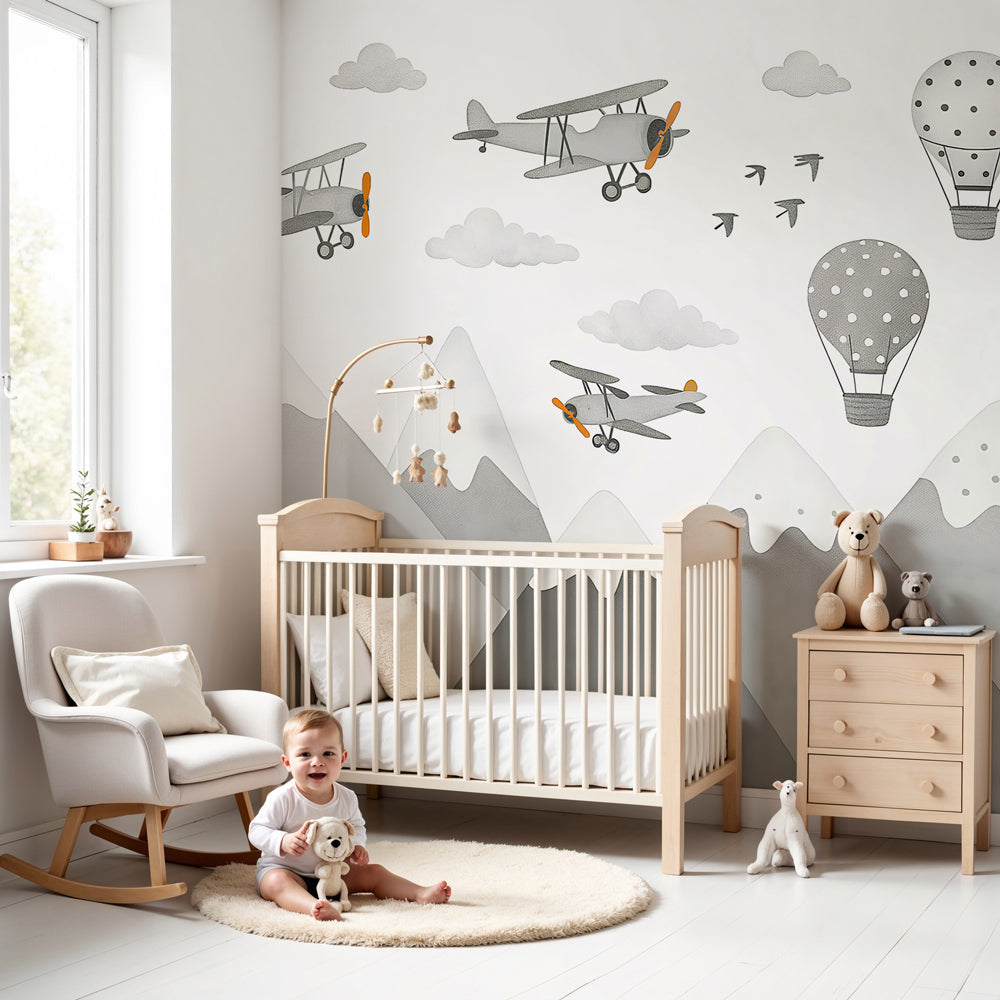 Mountain adventure mural wallpaper with vintage planes in modern nursery by Kids-Mundo