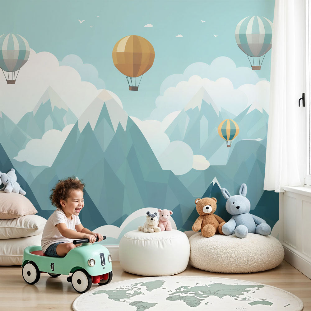 Kids-Mundo mountain and hot air balloon wall mural styled in a calm nursery with pastel blue tones.