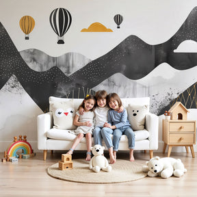 Mountain balloon mural wallpaper creating modern adventure decor in contemporary kids nursery by Kids-Mundo