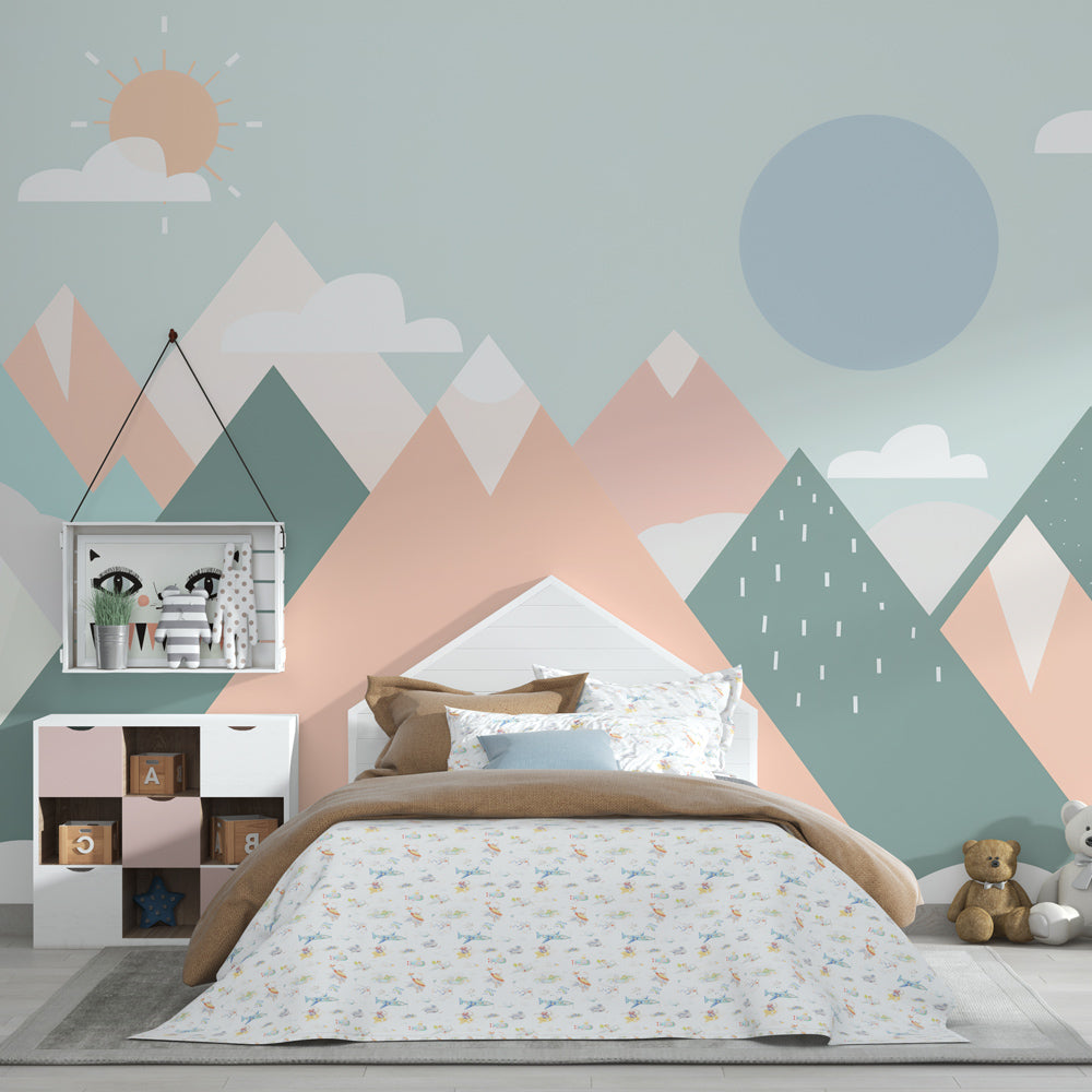 Soft pastel mountain mural wallpaper transforming children's playroom into peaceful retreat space