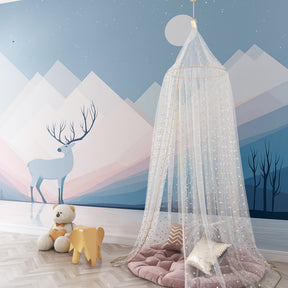Blue and pink mountain deer wallpaper transforming kids playroom into wilderness adventure space