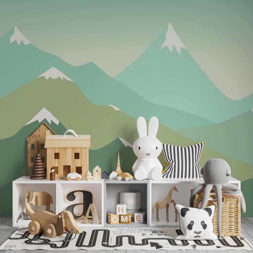 Nature-inspired mountain wallpaper transforming kids playroom with soft green and blue tones