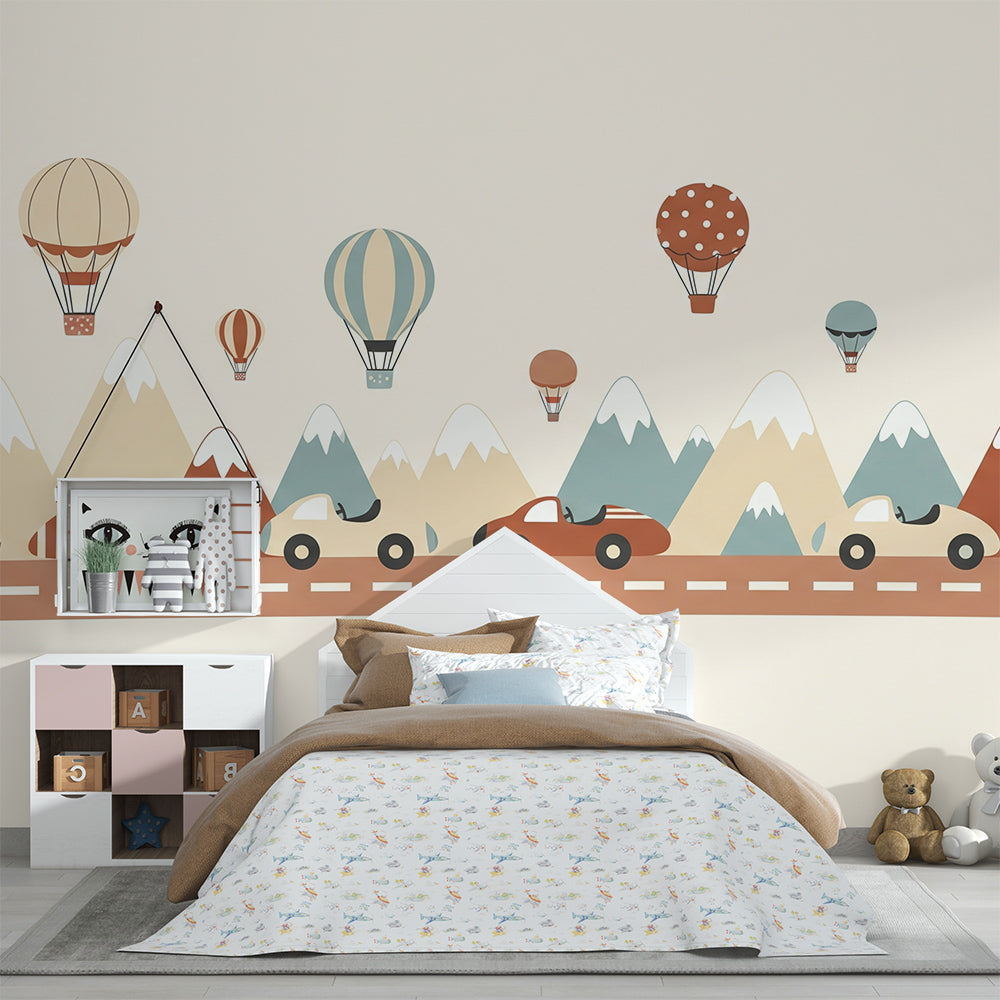 Kids-Mundo mountain road trip wall mural brightening a playroom with airships and balloons